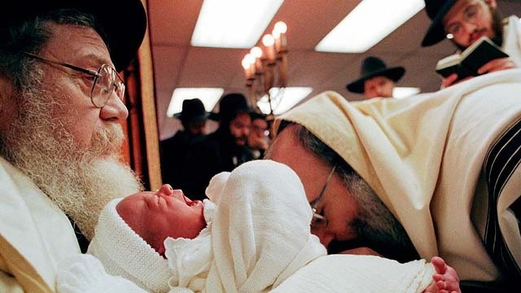 A mohel sucking the penis of an eight day old infant boy.
